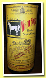 White Horse (70° proof, OB, for N.A.A.F.I. stores, H.M. Forces, 1960s) N.A.A.F.I. stands for Navy, Army and Air Force Institutes, so shops for British military staff, both in the UK and overseas. This is a UK bottling. Colour: gold. Nose: it’s very peaty and ashy and instantly reminds me of the current Lagavulin 16yo, with these notes of new rubber boots and tar. There’s a lot of brine as well, some ink, old books in an old attic in an old house, some seaweed, leather, a bit of sweet mustard and quite some pepper. It’s a very dry nose, the malt content is probably very high. Touches of manure coming through after a few minutes. Mouth: very big peat! It’s to be wondered why, while peaty malts are so fashionable these days, to my knowledge no big brands make some heavily peated blend anymore. Not talking about boutique ventures. So peat, then bitter oranges and a lot of brine/salt, green olives, sour apples, a little marzipan, some pepper… Now it also tends to become a little cardboardy, but that never gets embarrassing. The body’s impressive at just 40% vol. – probably only 37 or 38 after all these years in glass. Finish: long and massively salty. Almost pure smoked brine. More mint and liquorice in the aftertaste. Comments: a beast. I don’t know how much Lagavulin was added to this mix but that wouldn’t surprise me if someone said 40 or 50%. SGP:264 - 90 points.
